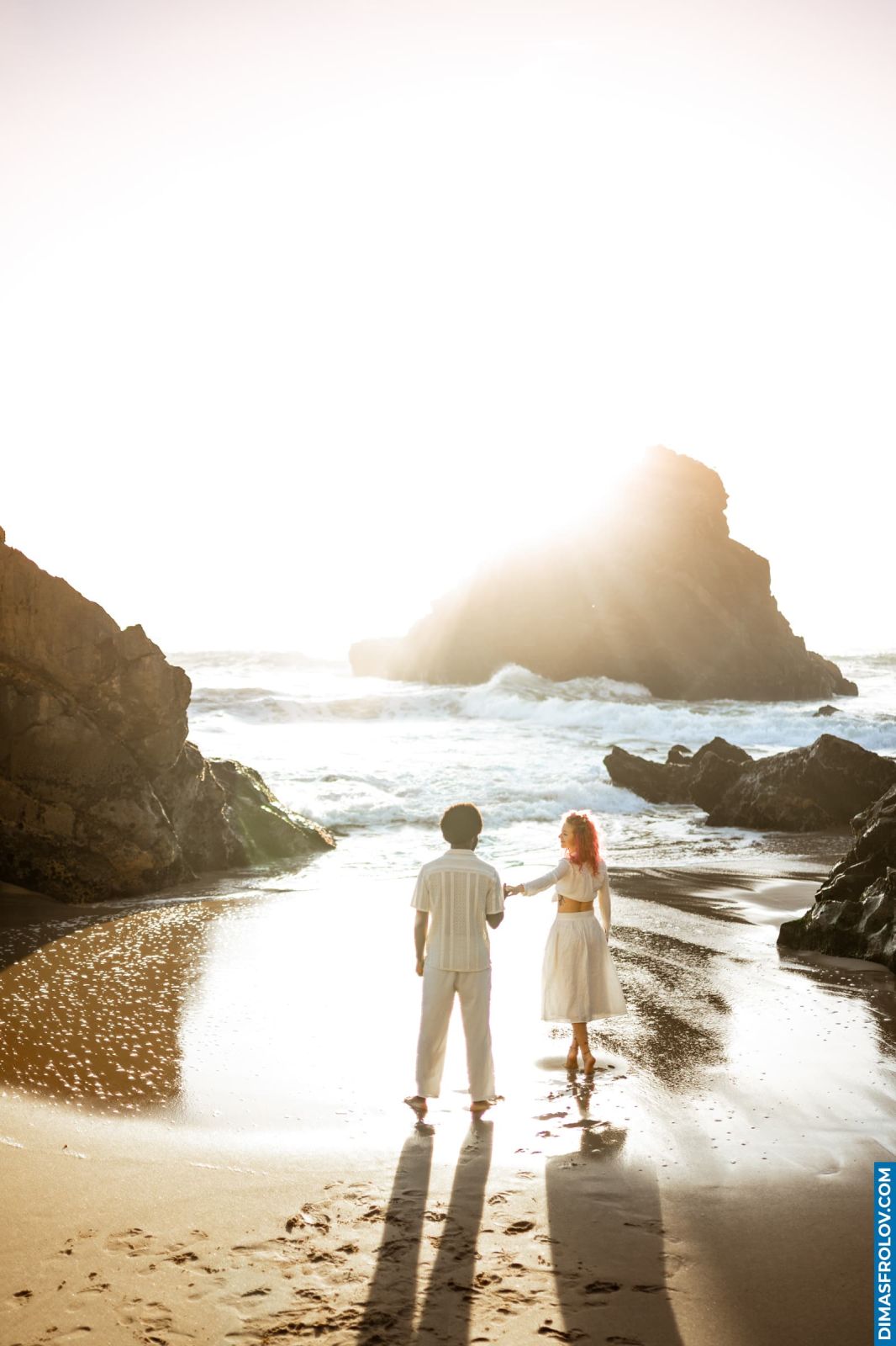 Couple on the Atlantic coast near Sintra at sunset